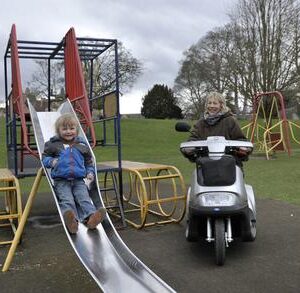 TGA Breeze S3 - Elderly woman using mobility scooter
